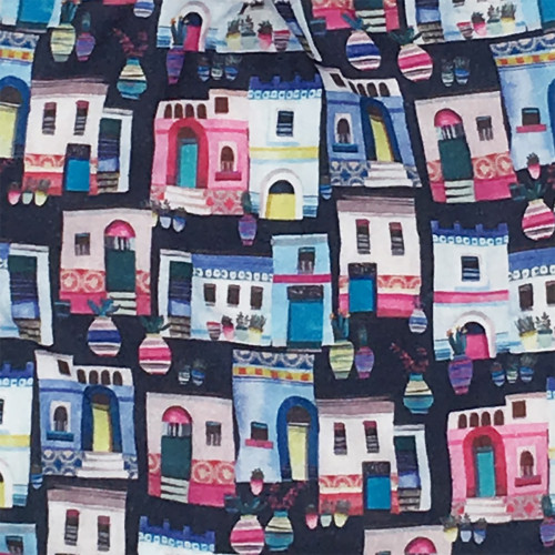 Tissu doudou Santorin représentant des petites maisons colorées. Cadeau personnalisable et made in France. Nin-Nin